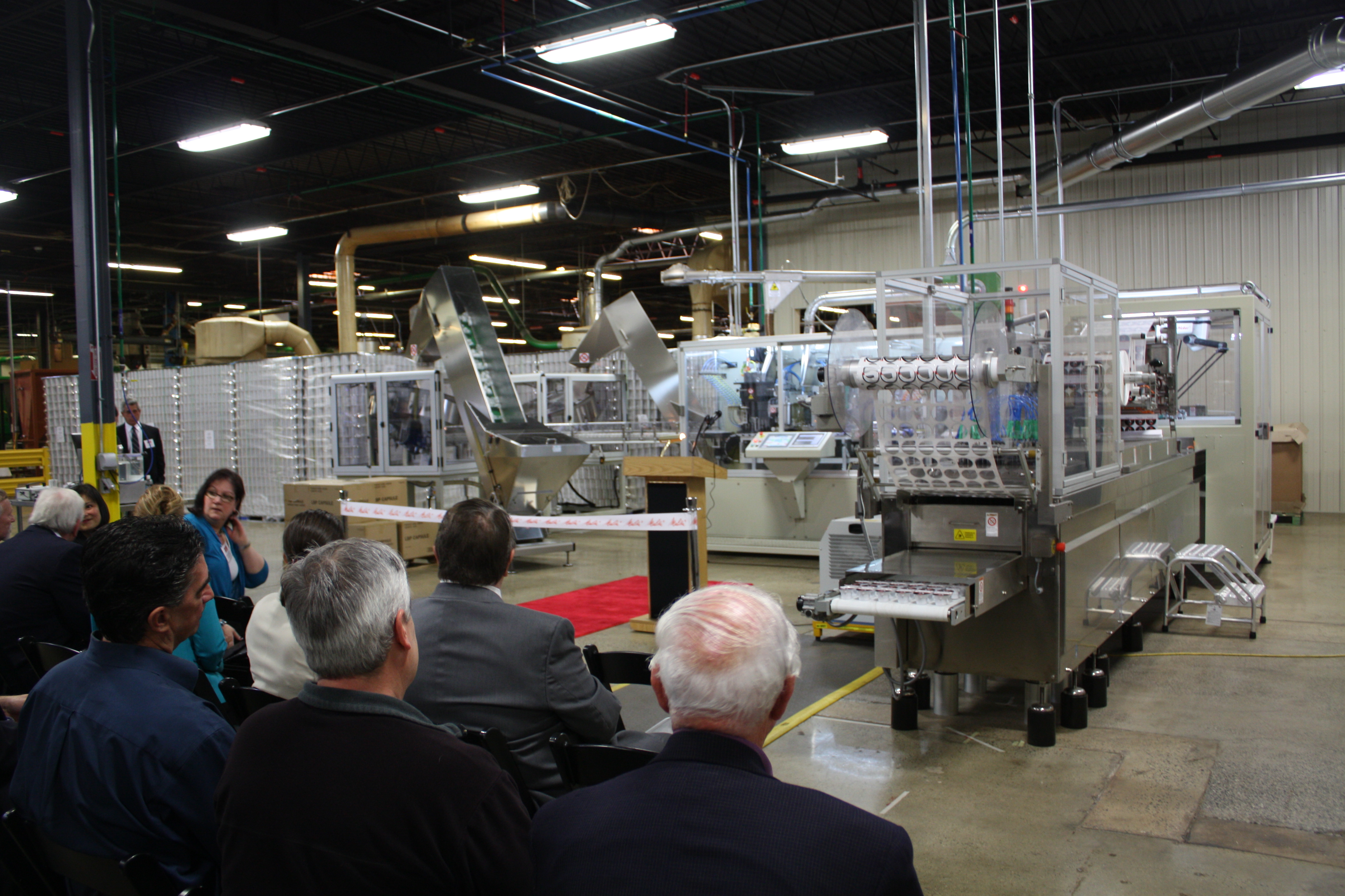 Melitta ribbon cutting 3